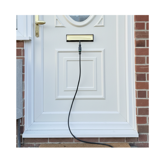 EV letterbox charging extension lead through a front door