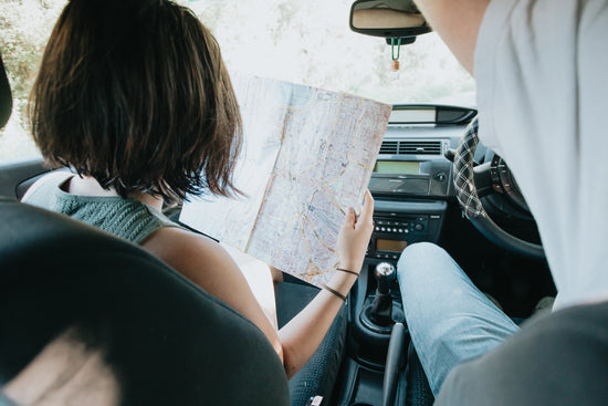 New EV driver appear to read a guide on electric car charging at home