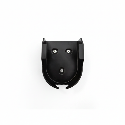 Black wall mount cradle mounted on a wall, purpose-made to house Stella Charge's All-In-One EV Mobile Charger
